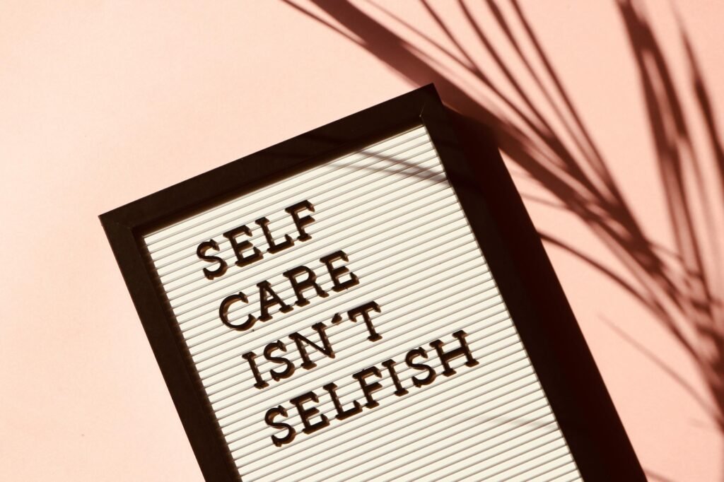 self care sunday - a motivational board that reads, "SELF CARE ISN'T SELFISH"