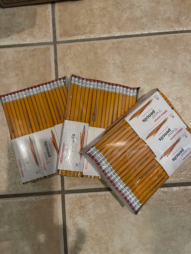 welcome back to school - a box of unopened pencils