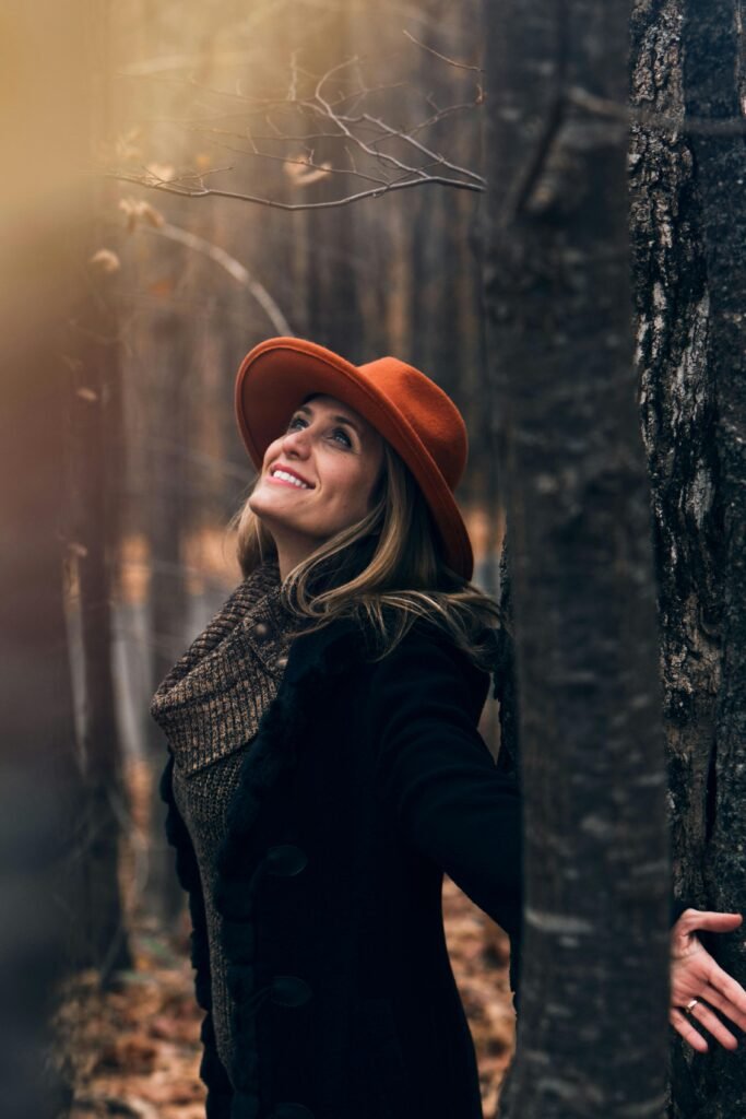 a baddie instagram caption worthy pic of a woman in the fall outdoors wearing fall attire