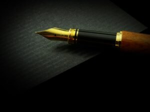 an image of a fountain pen on a black background