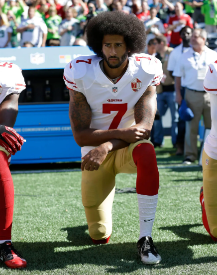 Inspirational quotes for young black males: Colin Kaepernick takes a knee during the national anthem in protest of police brutality