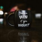motivational quotes for a new week: a black coffee mug reads, "YOU CAN WIN IF YOU WANT"