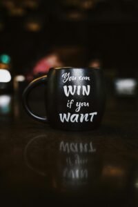 motivational quotes for a new week: a black coffee mug reads, "YOU CAN WIN IF YOU WANT"