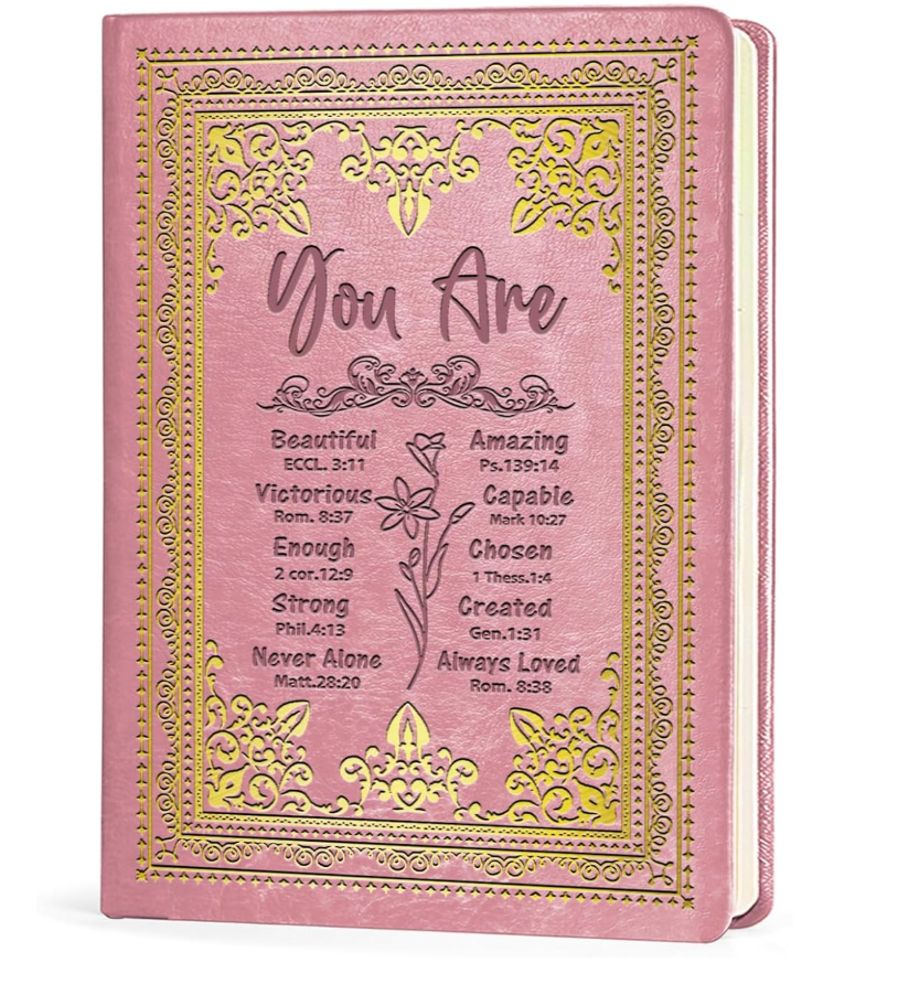 a picture of a pink inspirational journal with positive affirmations on the front cover
