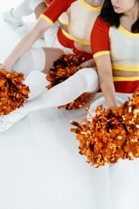 a picture of cheerleader pom poms