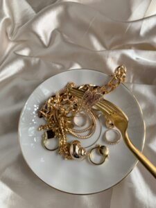 goddess energy usernames - a plate of expensive gold jewelry and a gold fork