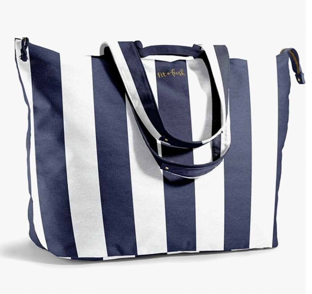 best tote bags for teachers - a blue and white oversized beach bag that has a nautical feel or look