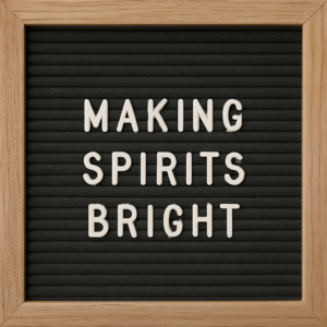 the featured image for this article which is a letter board that reads, "MAKING SPIRITS BRIGHT"
