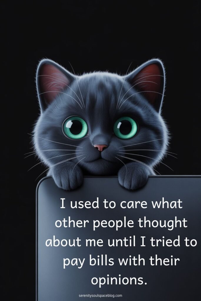 cute picture quote - black cat with exaggerated cartoon eyes sitting behind an open laptop