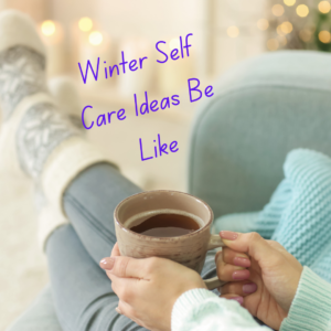 Winter Self Care Ideas Featured Image of a pair of feet wrapped in comfy winter socks, relaxed on the couch and holding a mug of a warm beverage